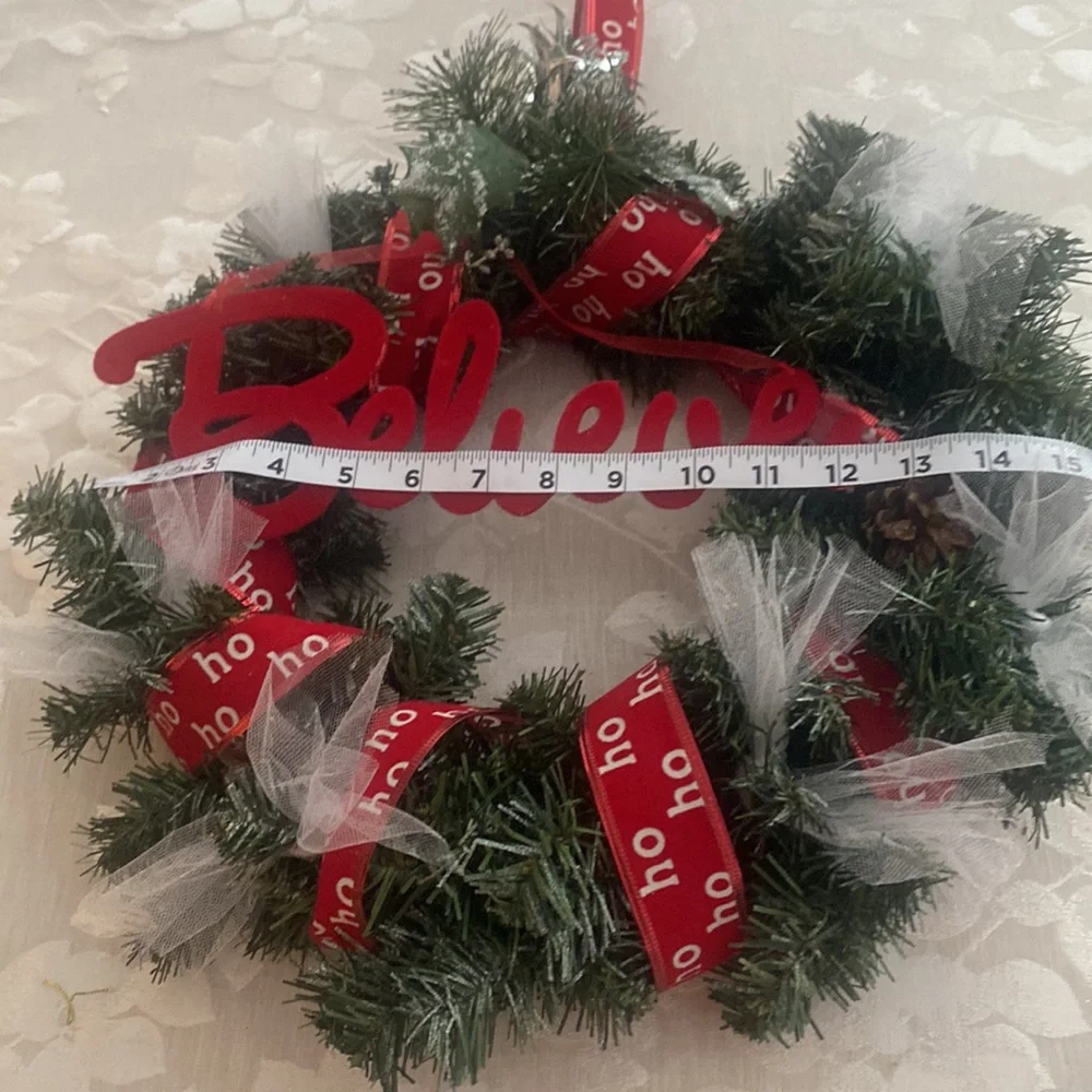 Winter holiday wreath with ho ho ho & BELIEVE adornments evergreen base